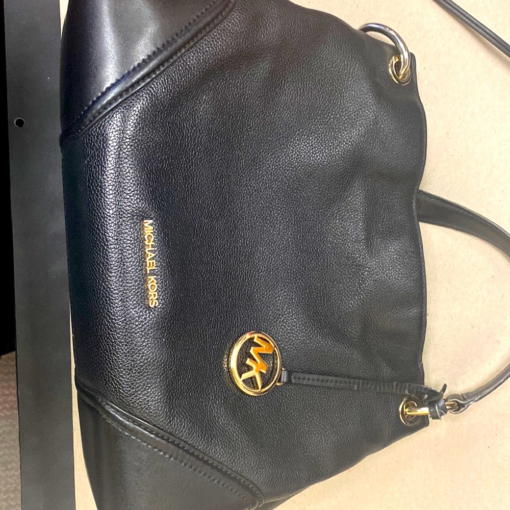Michael Kors Black w/gold accent medium tote bag. Great condition.